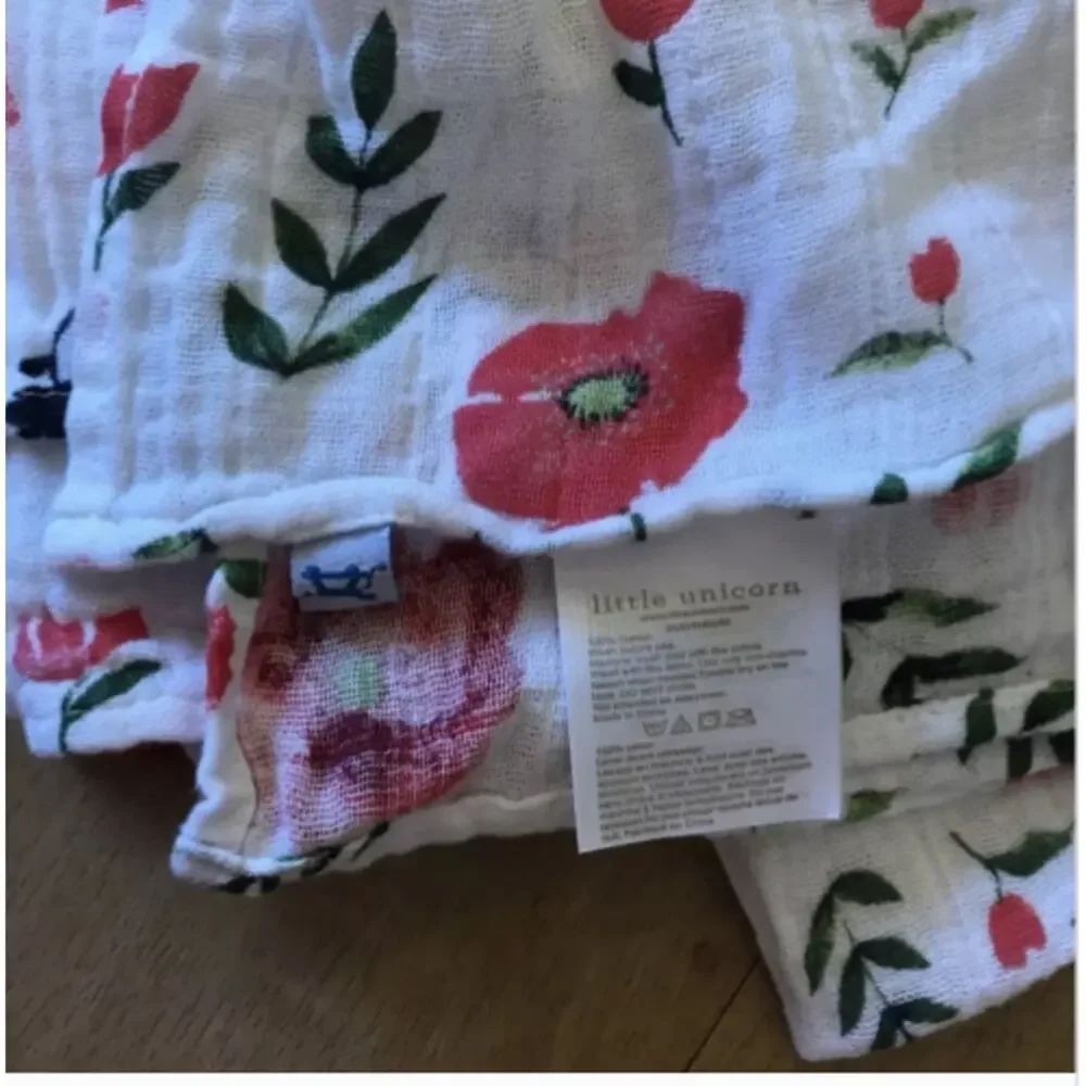 little unicorn Cotton Muslin Swaddle in SUMMER POPPY